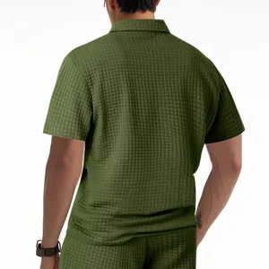 Detailed back view of men's olive green waffle knit short sleeve polo shirt and shorts set