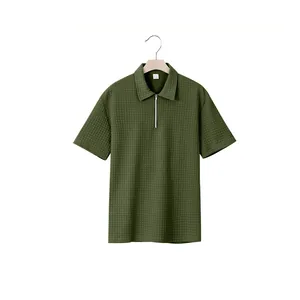 Men's heavy green jacquard polo shirt with zipper lapel and waffle texture.