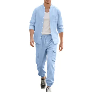 Full view of the men's light blue linen set showing the relaxed fit and fabric texture.