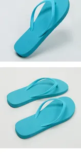 Detail view of sky blue flip-flops with non-slip texture and minimalist thong design.