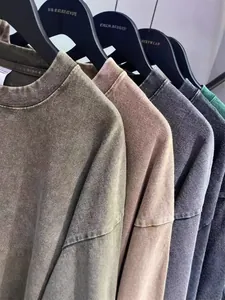 Premium heavyweight acid-washed distressed cotton t-shirts in various vintage earth tones
