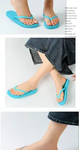 Macro view showing stylish bright blue rubber flip-flops for women summer beach wear