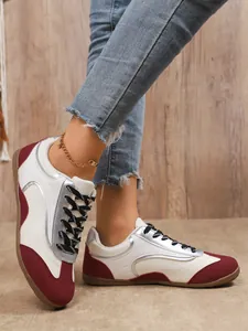 Stylish women's color-block German Army Trainers with soft soles in wine red.