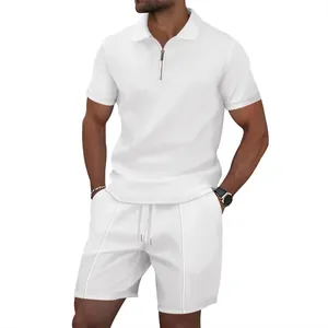 Men's summer casual two-piece set featuring white waffle knit polo shirt and shorts.