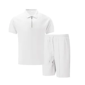 Detail of white waffle knit men's set with zipper polo shirt and matching shorts.