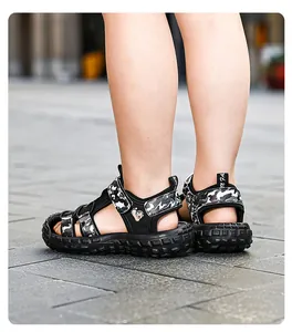 Close-up detail of boys' camouflage closed-toe sandals with thick anti-slip rubber sole