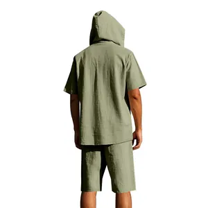Back view of men's sage green linen hooded short-sleeved shirt and shorts beach leisure set