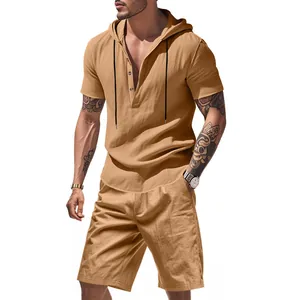 View of khaki linen hooded shirt and matching shorts on a model for summer beach style.