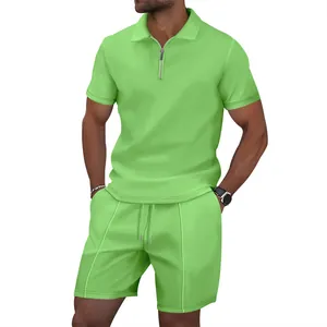 Detail view of men's lime green waffle knit quarter-zip polo and shorts leisure set