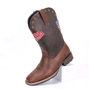 Close-up of brown square-toe cowboy boot with American flag star embroidery details