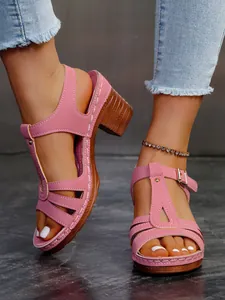 Modische rosa Römersandalen mit T-Riemen-Schnalle und dickem Absatz in Holzoptik