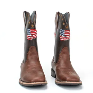 Detailed view of men's square toe cowboy boots featuring American flag and stars embroidery.