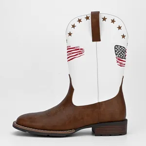 Detail of men's square toe cowboy boots with American flag embroidery and star patterns