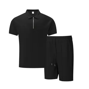 Men's casual black waffle knit short sleeve polo set with zipper and matching shorts.
