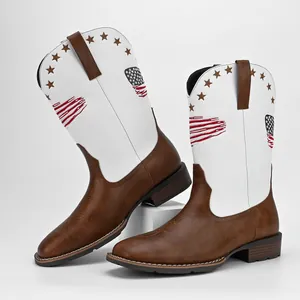 Detailed view of men's patriotic cowboy boots with American flag stars and stripes embroidery