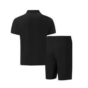 Detailed back view of men's black waffle knit short sleeve polo shirt and casual shorts set