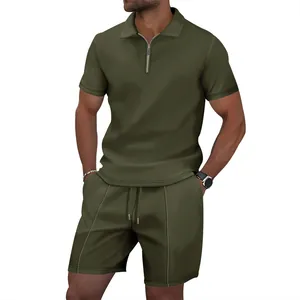 Detail of men's olive green waffle knit polo shirt and matching shorts casual set.