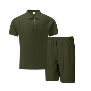 Detailed macro view of men's olive green waffle knit texture zip polo and shorts set.
