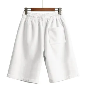 Back view of white corduroy shorts for men, featuring a single rear pocket and texture.