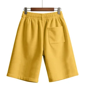 Detailed macro view of yellow corduroy fabric on minimalist men's casual sports shorts