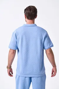 Back view of men's sky blue jacquard short-sleeve shirt with textured pattern detail