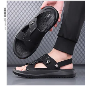 Side detail view of black men's two-way beach sandals featuring a soft non-slip sole design
