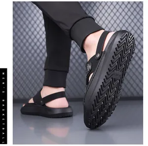 Detailed view of non-slip sole and dual-use design of men's black beach sandals