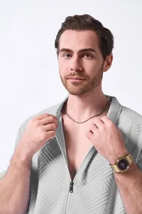 Close-up of men's casual jacquard cardigan with zipper detail in light grey