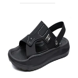 Macro detail of black non-slip men's sandals with adjustable heel strap for beach wear
