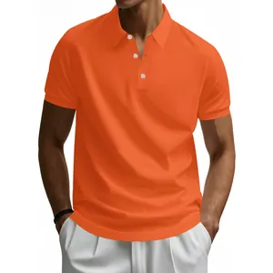 Detail of a bright orange quick-dry polo shirt with classic lapel and white buttons.