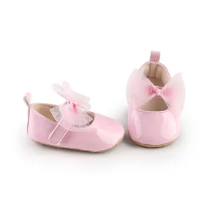 Zapatos de princesa de charol rosa para bebé niña con gran lazo de tul