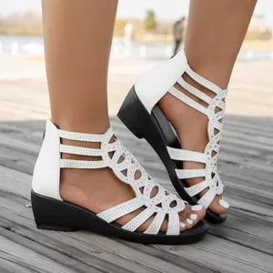 White Roman wedge sandals for women with hollow-out rhinestone design for summer time.