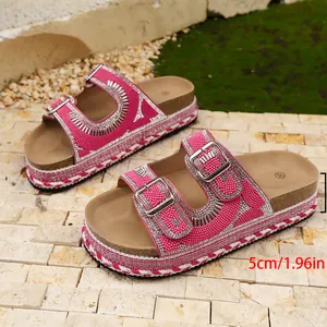 Detailed view of pink rhinestone platform sandals showing the 5cm or 1.96in height.
