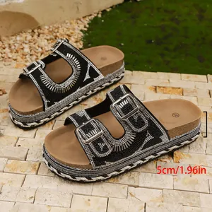 Detailed side view of platform sandals with rhinestone buckles and 1.96in height