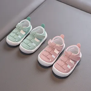 Breathable closed-toe hollow toddler sandals with soft anti-slip soles in pink and mint green
