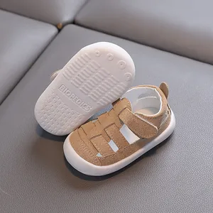 Brown suede toddler closed-toe walking sandals with breathable hollow design and soft white sole
