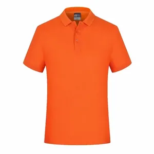 Detailed view of a vibrant orange men's breathable short sleeve pique cotton polo shirt