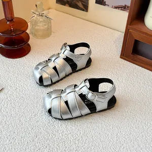 Stylish silver woven Roman sandals for kids with closed-toe design