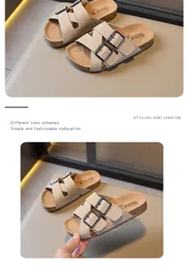 Detailed close-up of beige breathable children's sandals with double buckle straps.