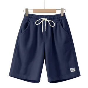 Short en velours côtelé bleu marine pour homme avec cordon de serrage et écusson logo