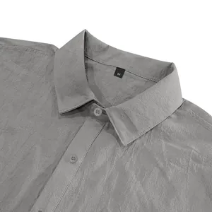 Close-up detail of the grey linen casual shirt collar and texture of the fabric