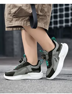 Boys mesh breathable running shoes with rotating buckle closure and grey colorway