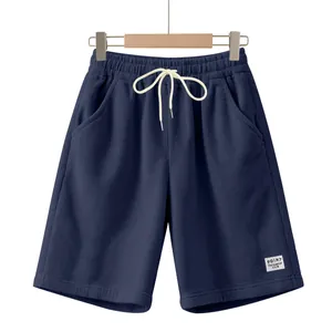 Close-up macro view showing navy blue corduroy fabric texture and white drawstring details