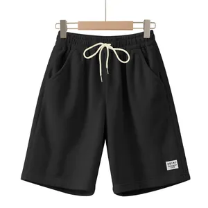 Classic black corduroy drawstring shorts for men featuring a minimalist design