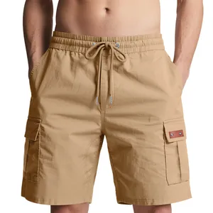 Detail view of men's khaki cargo shorts featuring drawstring waist and large pockets