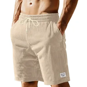 Detail view of men's corduroy shorts showing textured fabric and drawstring.