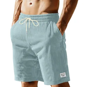 Close-up of men's light blue corduroy shorts featuring drawstring waist and side pockets.