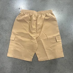 Detailed back view of mens khaki casual cargo shorts featuring elastic waist and flap pockets