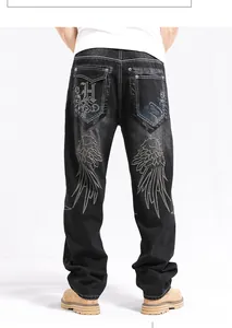 Men's loose black streetwear jeans featuring detailed wing embroidery on the back