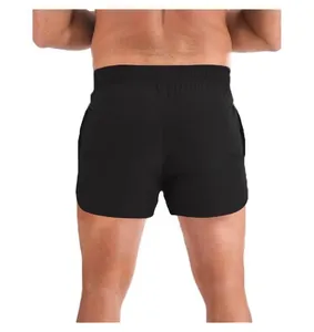 Back view detail of men's black quick-dry athletic shorts with an elastic waistband.